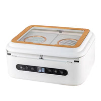 A9 pet drying box folded flat with two top ventilation grilles, gold trim, and front digital control panel