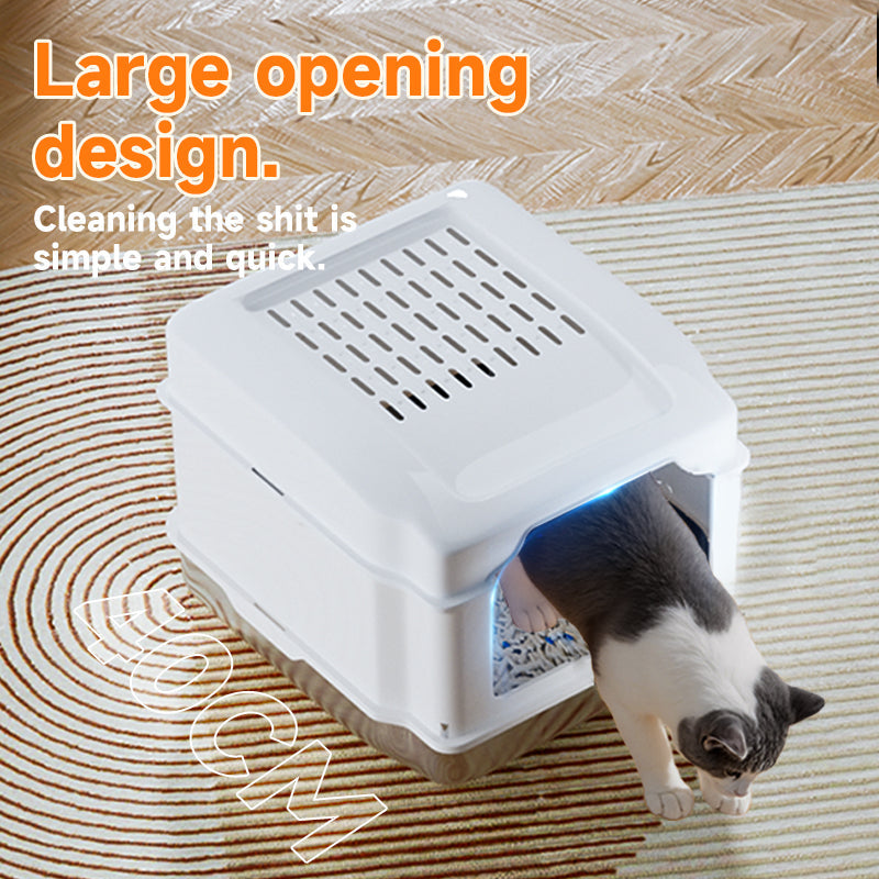 White S5 stainless steel cat litter box with a black and white cat entering, highlighting the large opening design