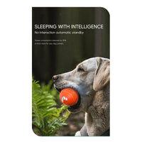 Weimaraner dog holding an orange Q6 dog ball in its mouth in a forest, automatic sleep standby feature text